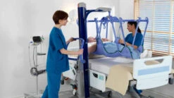 Arjo Maxi Move Floor Lifter Patient Lift - Medium Powered DPS -Health Care Store ArjoHuntleigh Patient Transfer Solutions Maxi Move two carers one patient stretcher frame and bed Product Page Main Image